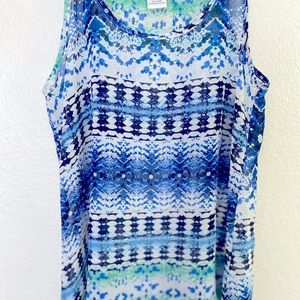 Woman’s semi sheer tank top 100% Polyester.